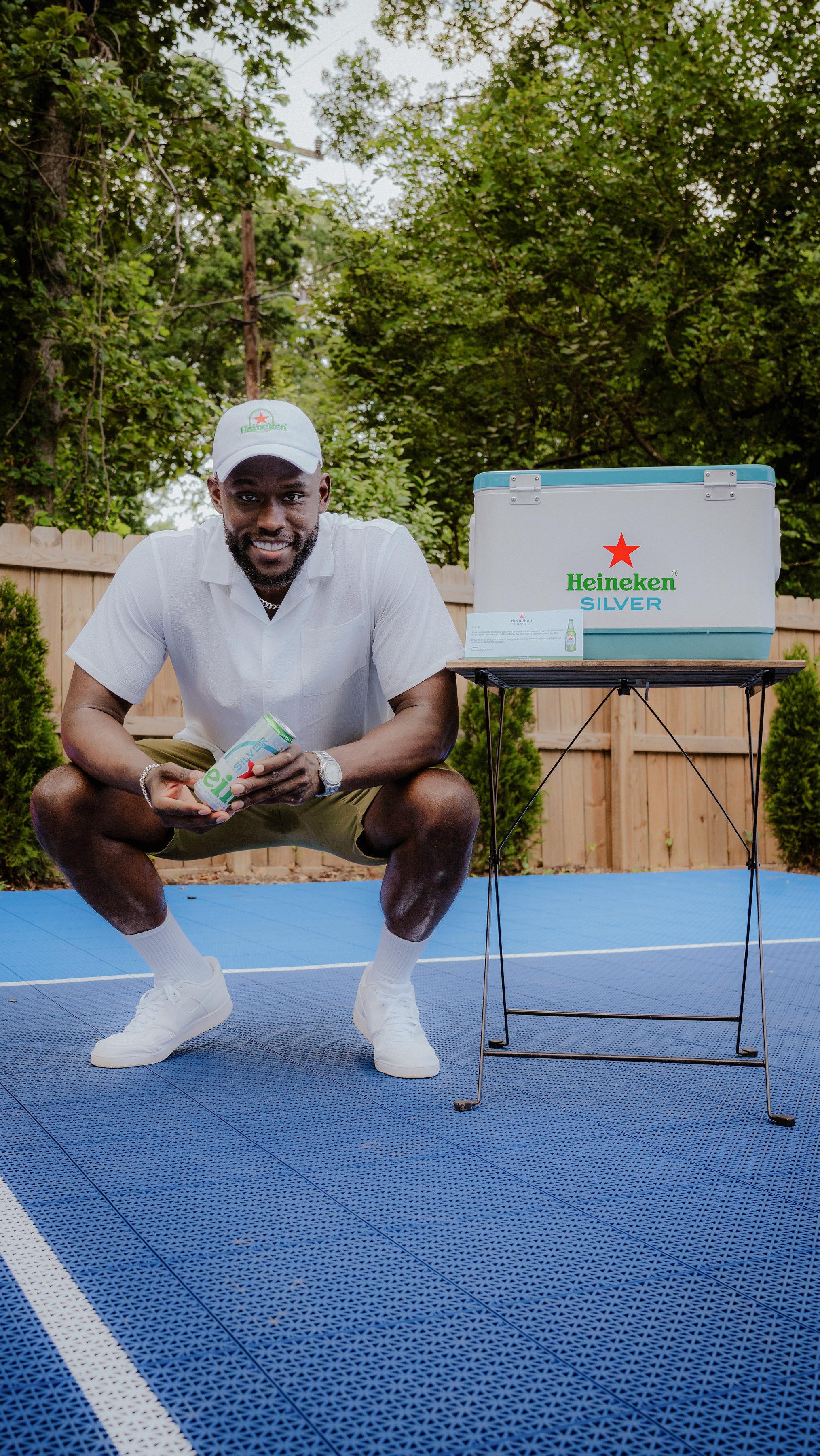 Instagram post by @jaylan_mobley for Heineken US. Caption reads: Nothing hits like summer moments with the crew,....