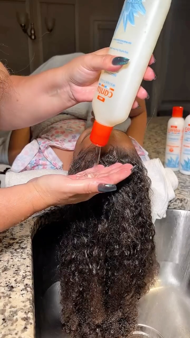 Instagram post by @shimycatsmua for Cantu Beauty. Caption reads: Wash days with my girl just got easier 💕 The new....