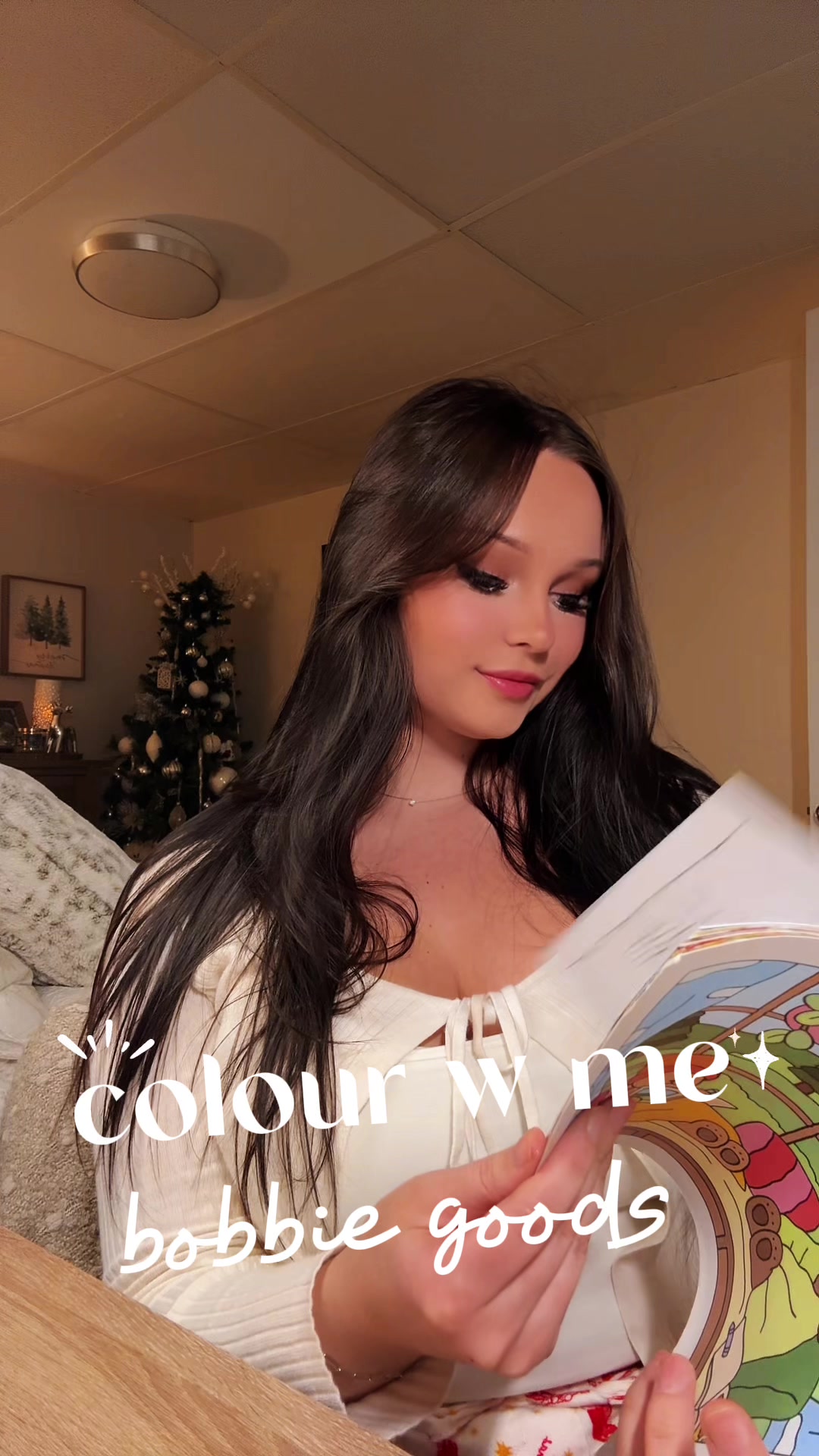 TikTok post by @ashleytaylorx for Bobbie Goods. Caption reads: colour w me in my @bobbiegoods fall winter ❄️....