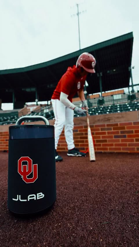 Instagram post by @ou_baseball for JLab. Caption reads: sights and sounds 🔊 @jlabaudio.