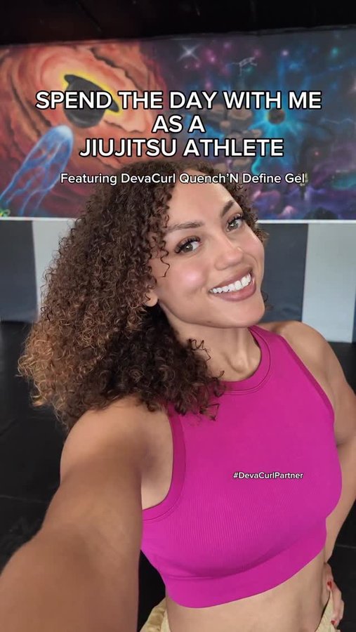 Instagram post by @taelornmoore for DevaCurl. Caption reads: Discipline on the mats, definition in my curls....