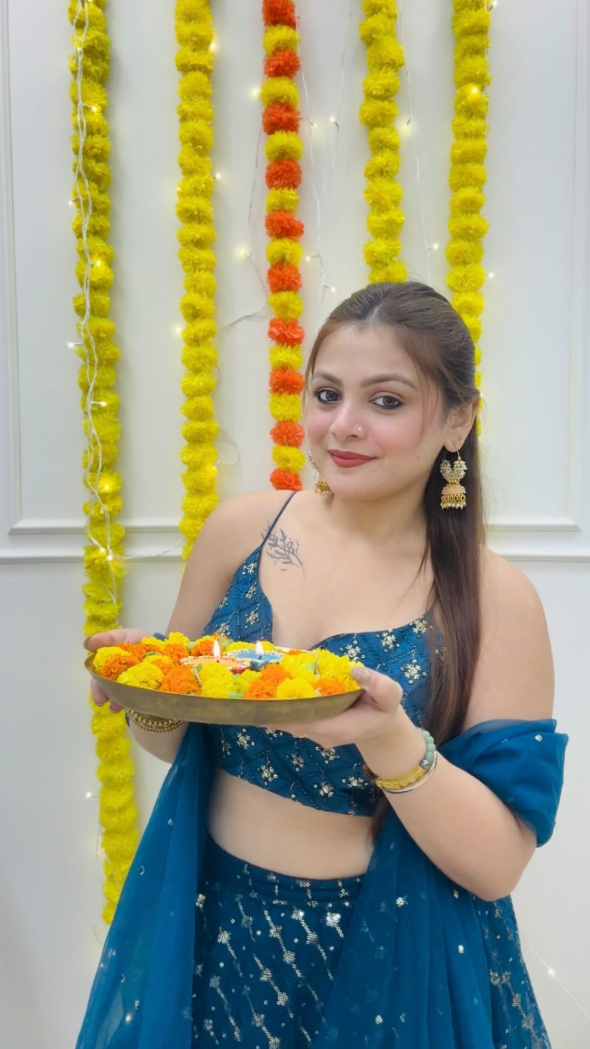 Instagram post by @oliviaaaa.m_ for Makeup Revolution. Caption reads: Get ready to shine this festive season with....