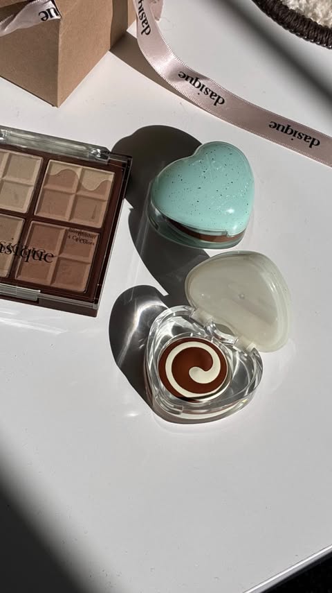Instagram post by @kanaebarrio for Dasique USA. Caption reads: The chocolate collection has launched globally at....