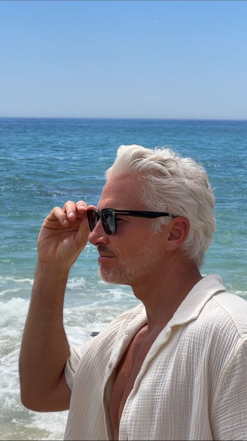 Instagram post by @themichaeljustin for OneSkin. Caption reads: [...] of my hair lately — My new go-to is....