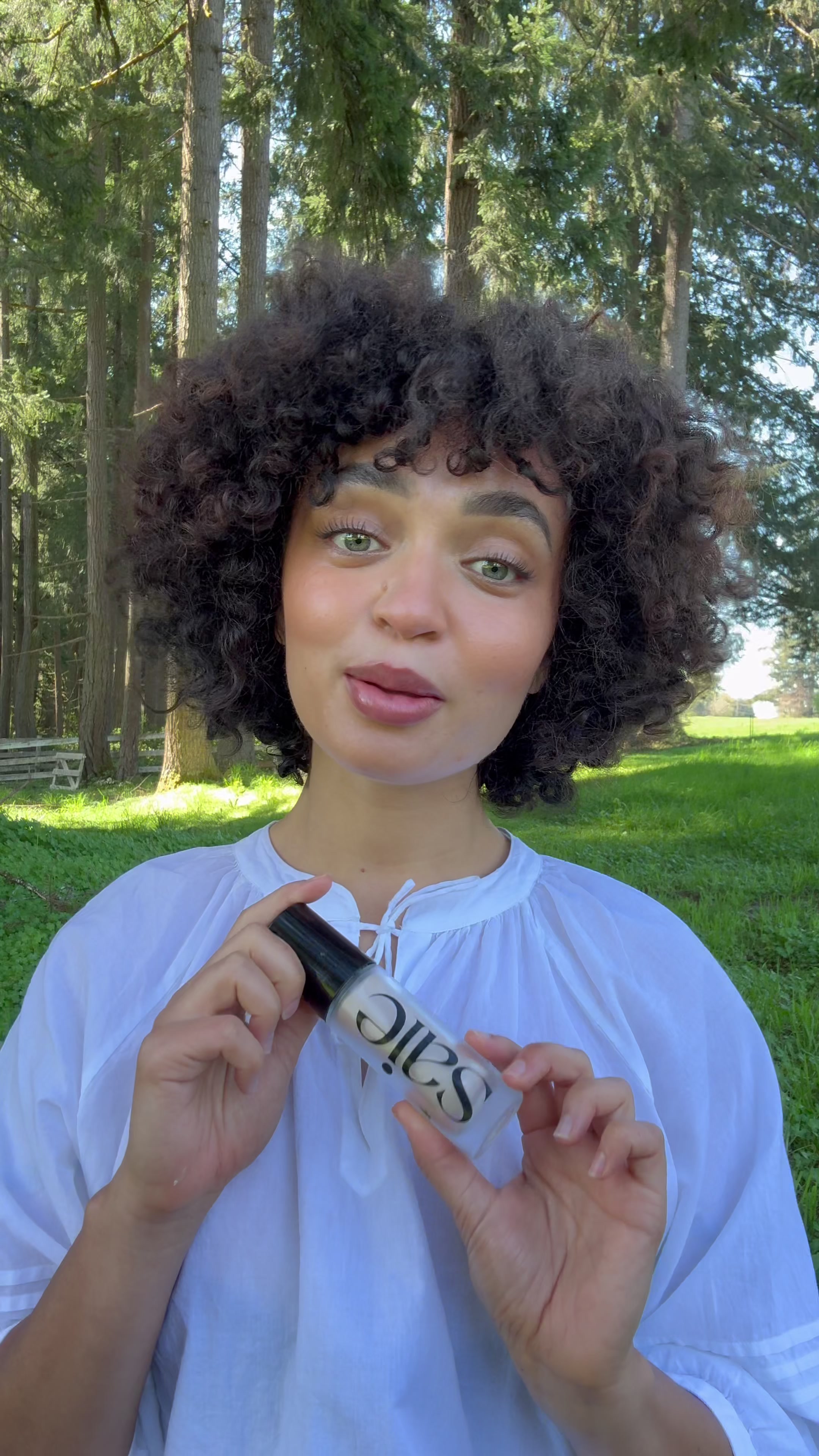 TikTok post by @climatediva for Amika. Caption reads: [...] doing it right: @Saie @Alpyn Beauty @amika....