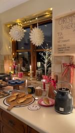 Instagram post by @sisterssharingstyle for Smiley. Caption reads: [...] my kitchen into a Christmas bakery with....