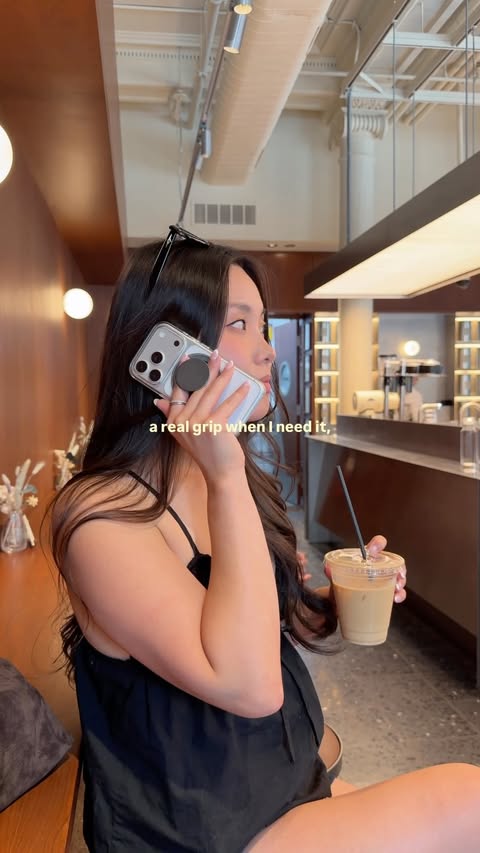 Instagram post by @imjenncho for PopSockets. Caption reads: a dainty & functional travel accessory @popsockets.