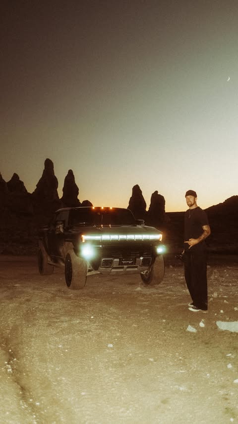 Instagram post by @tuckerdoss for GMC. Caption reads: Totally worth it @gmc.
.
.
.
#hummerev #cinematic....