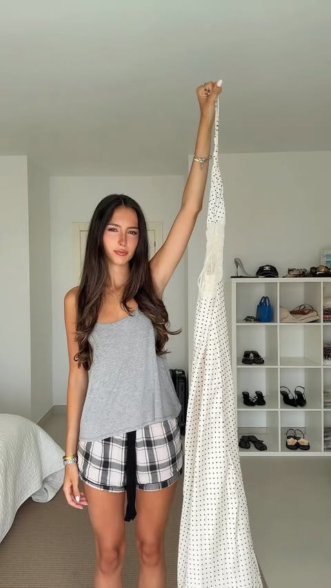 Instagram post by @alexiabelitsas for Cider. Caption reads: Love this dress @shopcider 🖤 #polkadot #dress....