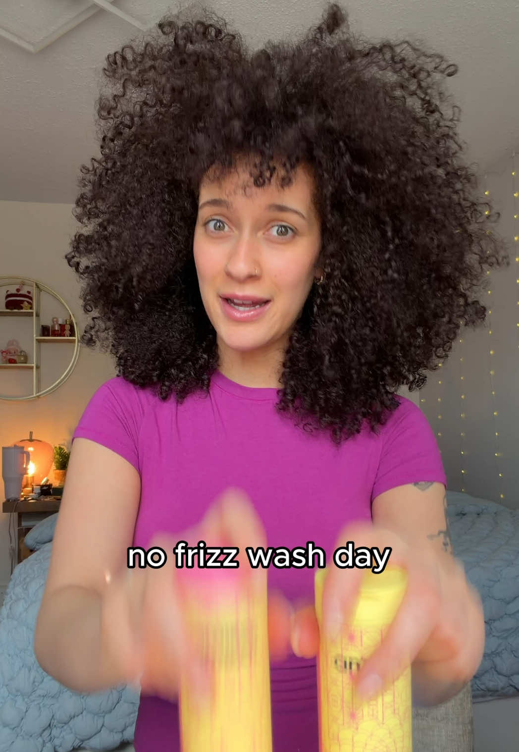 TikTok post by @trulue for Amika. Caption reads: Frizz? I hardly know her 😏 @amika is 30% off for....