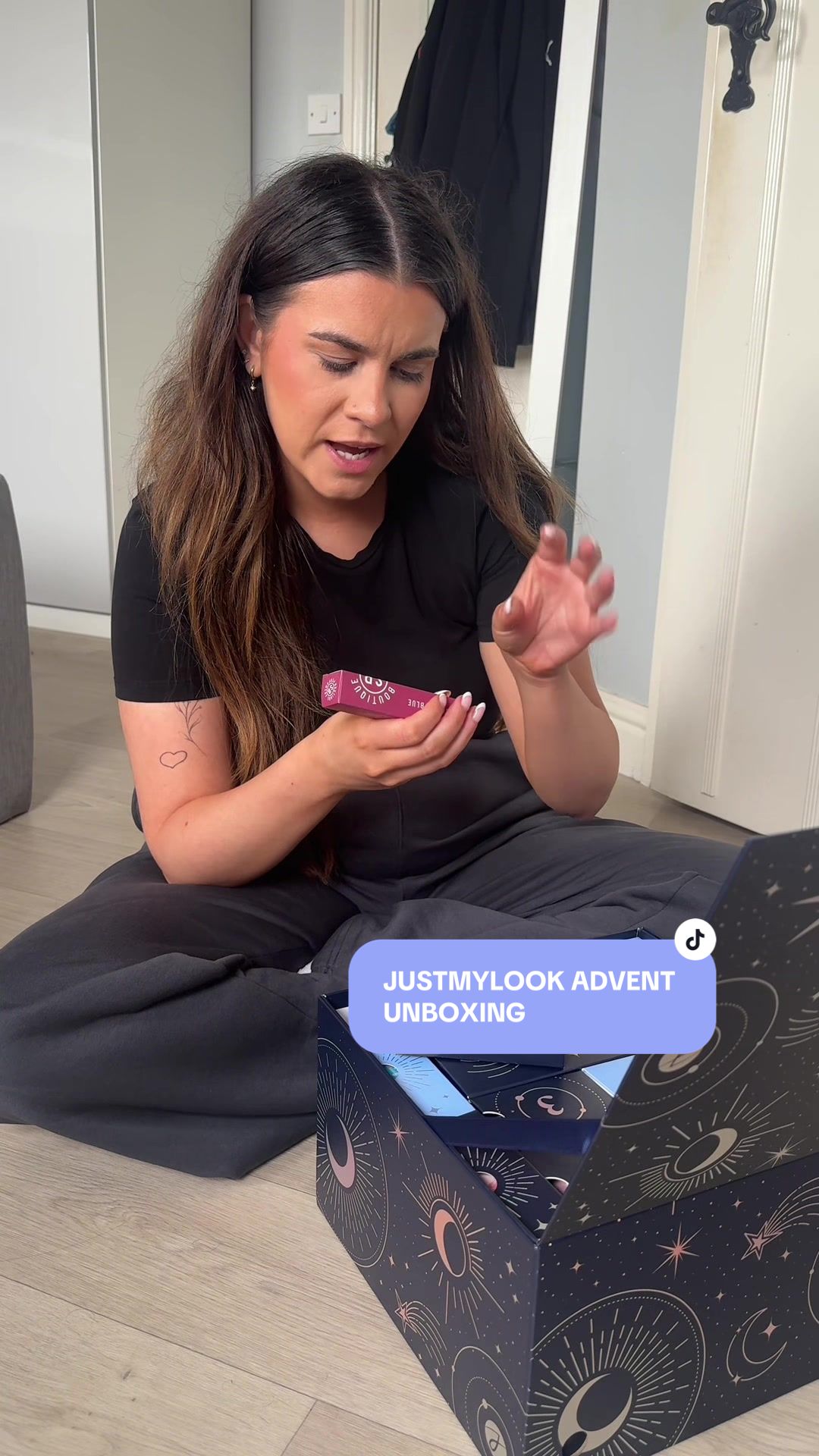TikTok post by @elliecheesmanxxxx for Truly Beauty. Caption reads: The FULL unboxing of the @justmylook advent....