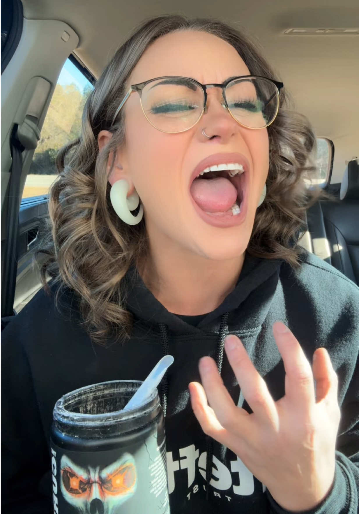 TikTok post by @laurabmullis for JNX Sports. Caption reads: [...] the pain fuels you enough. #sponsored @JNX....