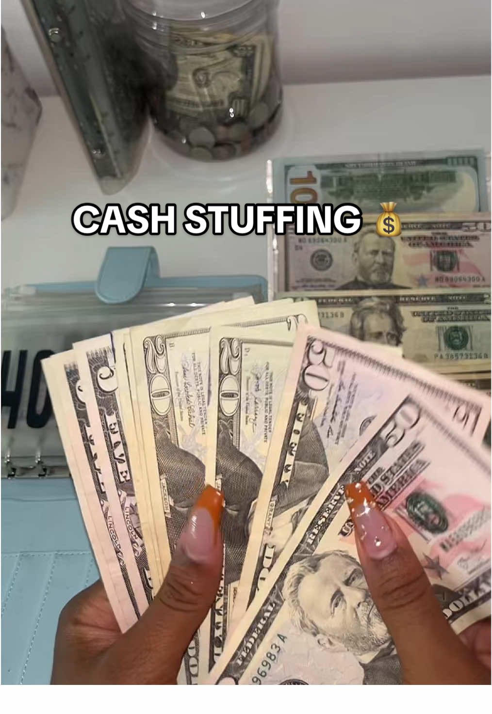 TikTok post by @budgetinggoods for Fetch. Caption reads: @Fetch #100envelopechallenge #cashenvelopes....