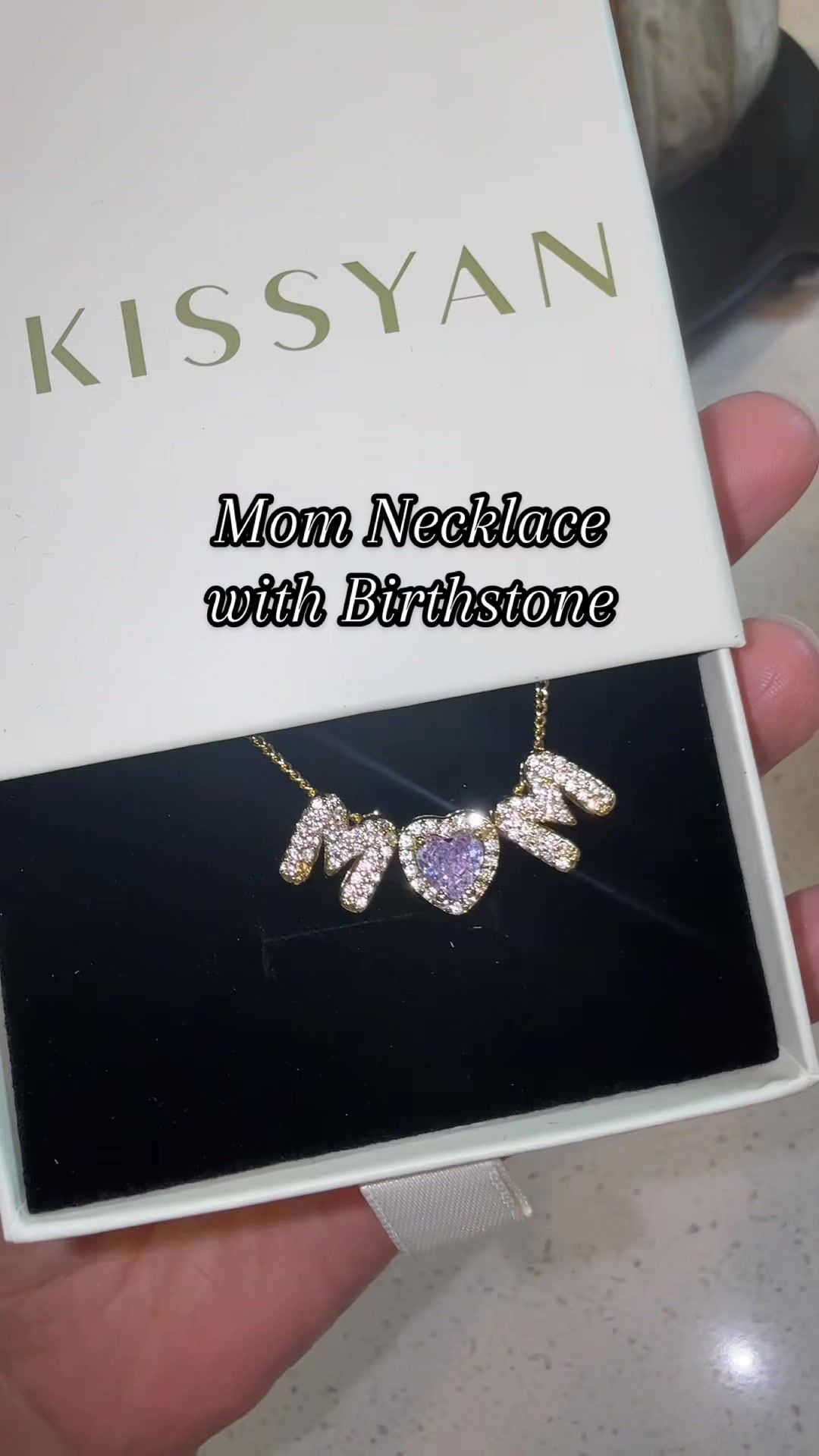 TikTok post by @itstiffslife for KissYan Jewelry. Caption reads: [...] birthstone from @KissYanOfficial @KissYan....