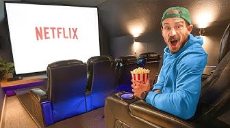 YouTube post by @MrBuildit for Valencia Theater Seating. Caption reads: I Built a DIY Secret Movie Theater In My House.
