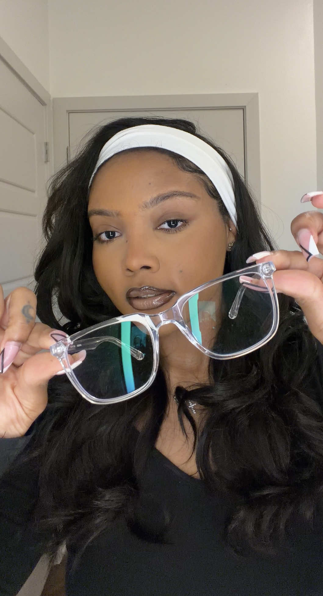 TikTok post by @saaycari for LTK. Caption reads: [...] 🤓 shop more of glassesUSA on the LTK app!....