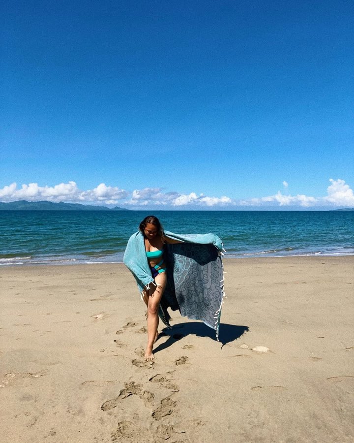 Instagram post by @unalotawa for Sand Cloud. Caption reads: [...] item....