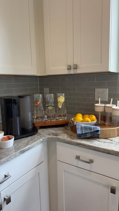 Instagram post by @casagrella for Aquasana. Caption reads: [...] I finally set up a drink station with....