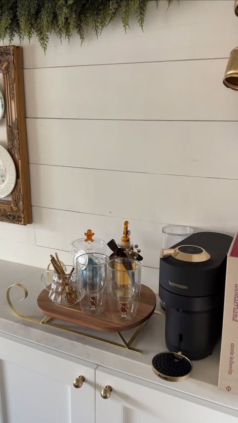 Instagram post by @stagedby.ana.egger for Nespresso. Caption reads: #ad You know I had to style a holiday coffee bar....