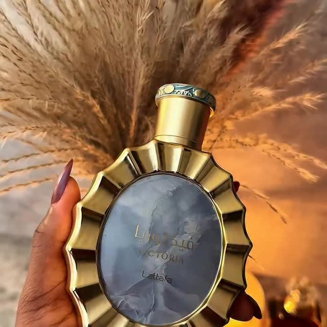 Instagram post by an influencer for Lattafa Perfumes. Caption reads: [...] #arabianperfumes #lattafaperfumes.