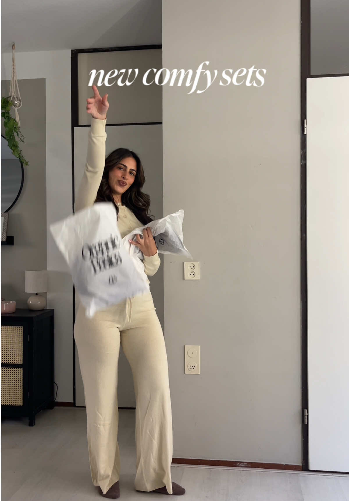 TikTok post by @carlinaerikinn for Organic Basics. Caption reads: [...] for y'all: CARLINAXOB10 🤍 @Organic Basics....