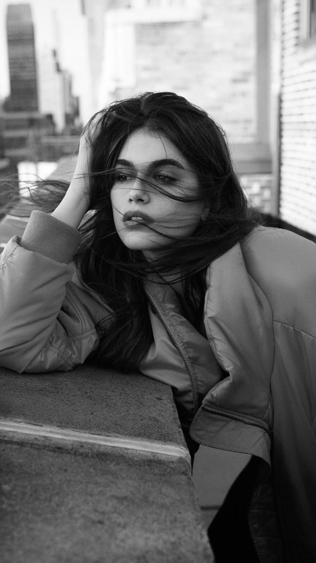 Instagram post by @kaiagerber for DKNY. Caption reads: From classic literature to iconic movies to music....