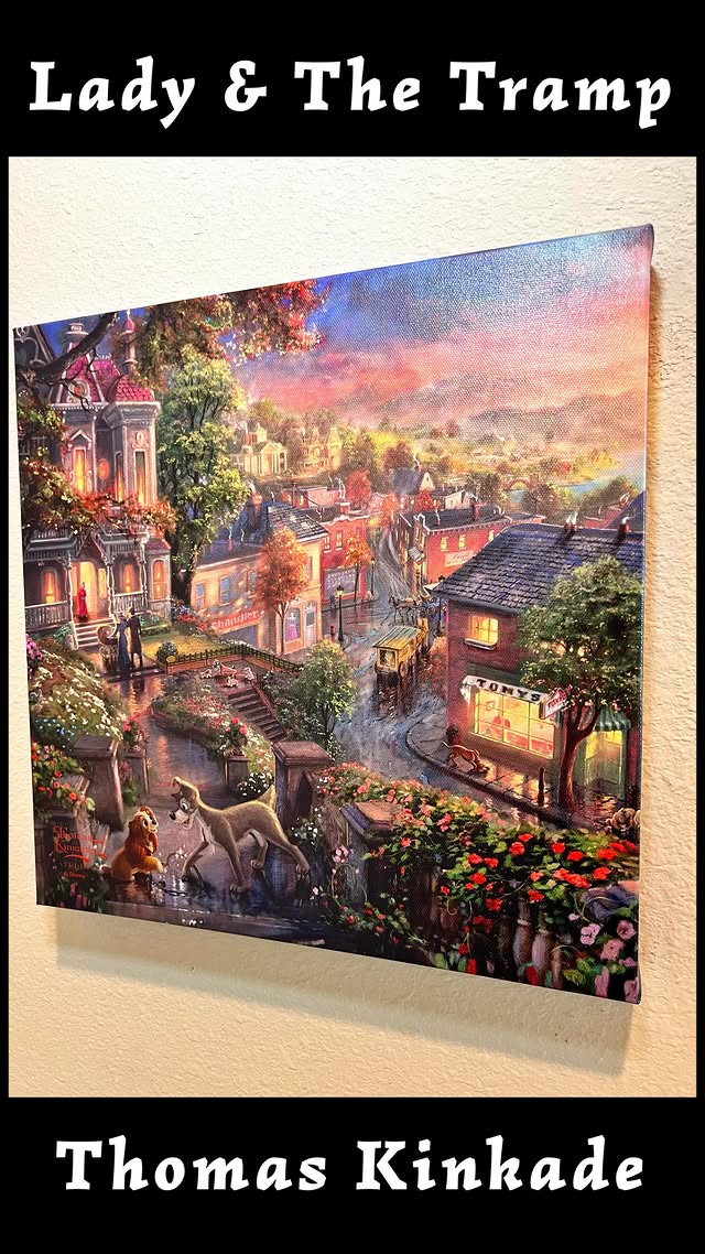 Instagram post by @pixieandmagic for Thomas Kinkade Studios. Caption reads: 🐶Disney Lady & The Tramp🐾
•
{AD} One of our....