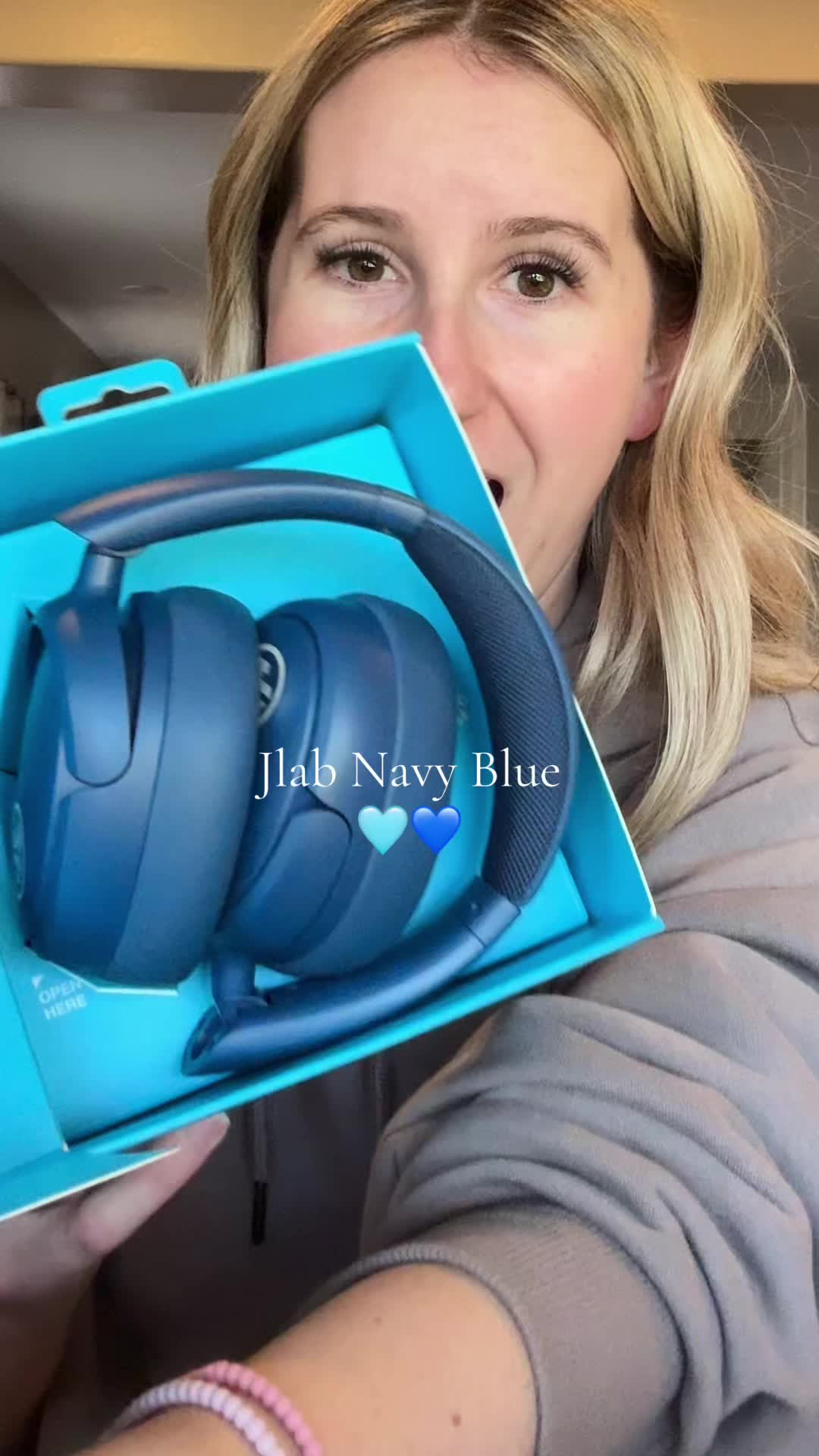 TikTok post by @raisingbabyt for JLab. Caption reads: [...] and exclusive only on tts! 🤩 @JLab #jlab....