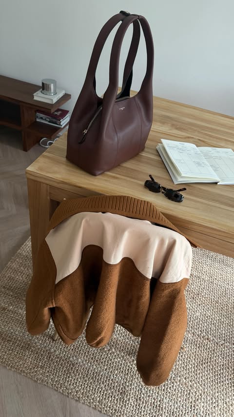 Instagram post by @paris.with.me for Le Tanneur. Caption reads: [...] 🐻 (wearing this jacket non stop) bag....