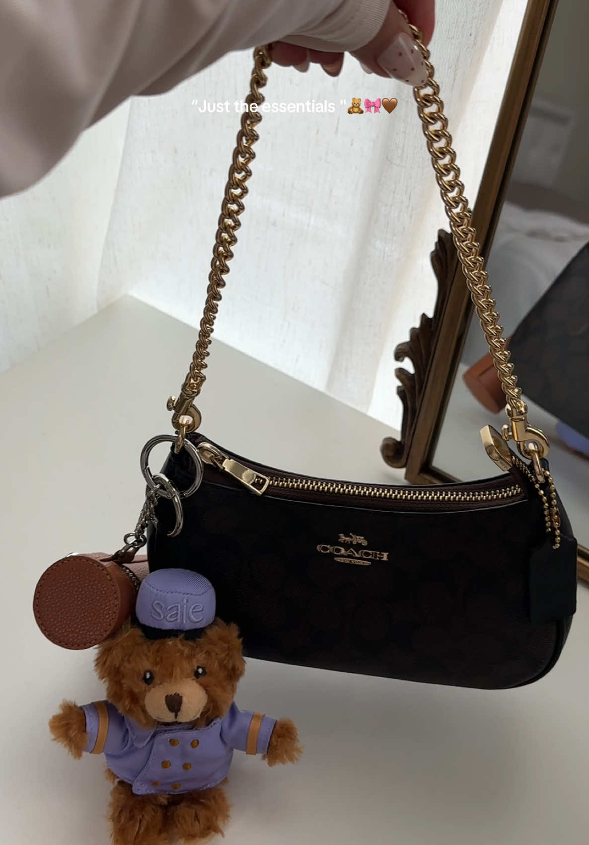 TikTok post by @sarahy_reyesg for Saie hello. Caption reads: Today’s essentials, but make it soft luxury 🤎🧸....