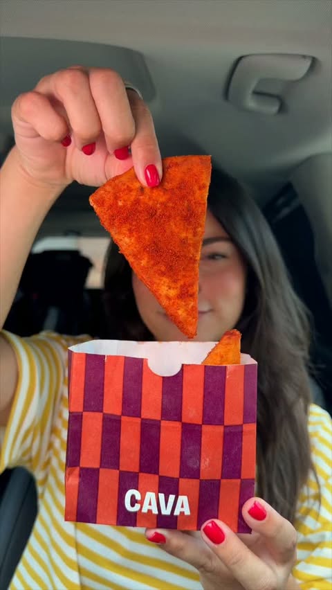 Instagram post by @serinaamadee.eats for CAVA. Caption reads: @cava Mukbang | NEW Harissa BBQ Pita Chips 🥗....