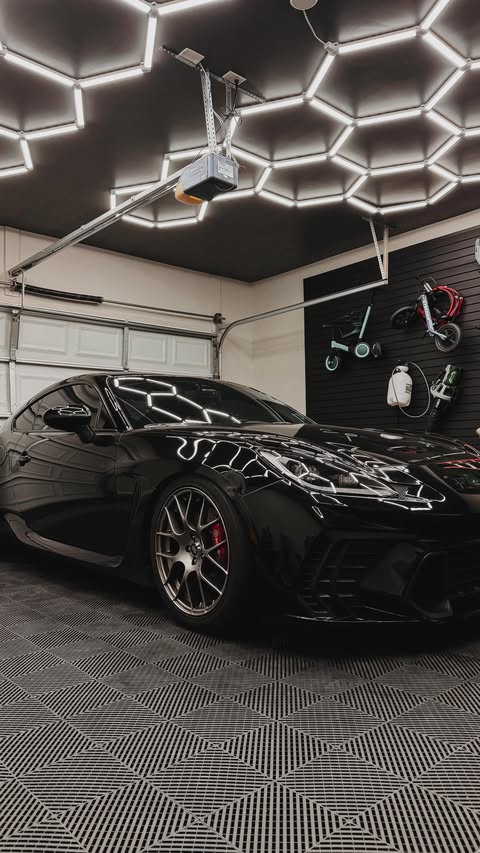 Instagram post by @drewpow for Enbrighten. Caption reads: Giving my brother in law his dream garage thanks....