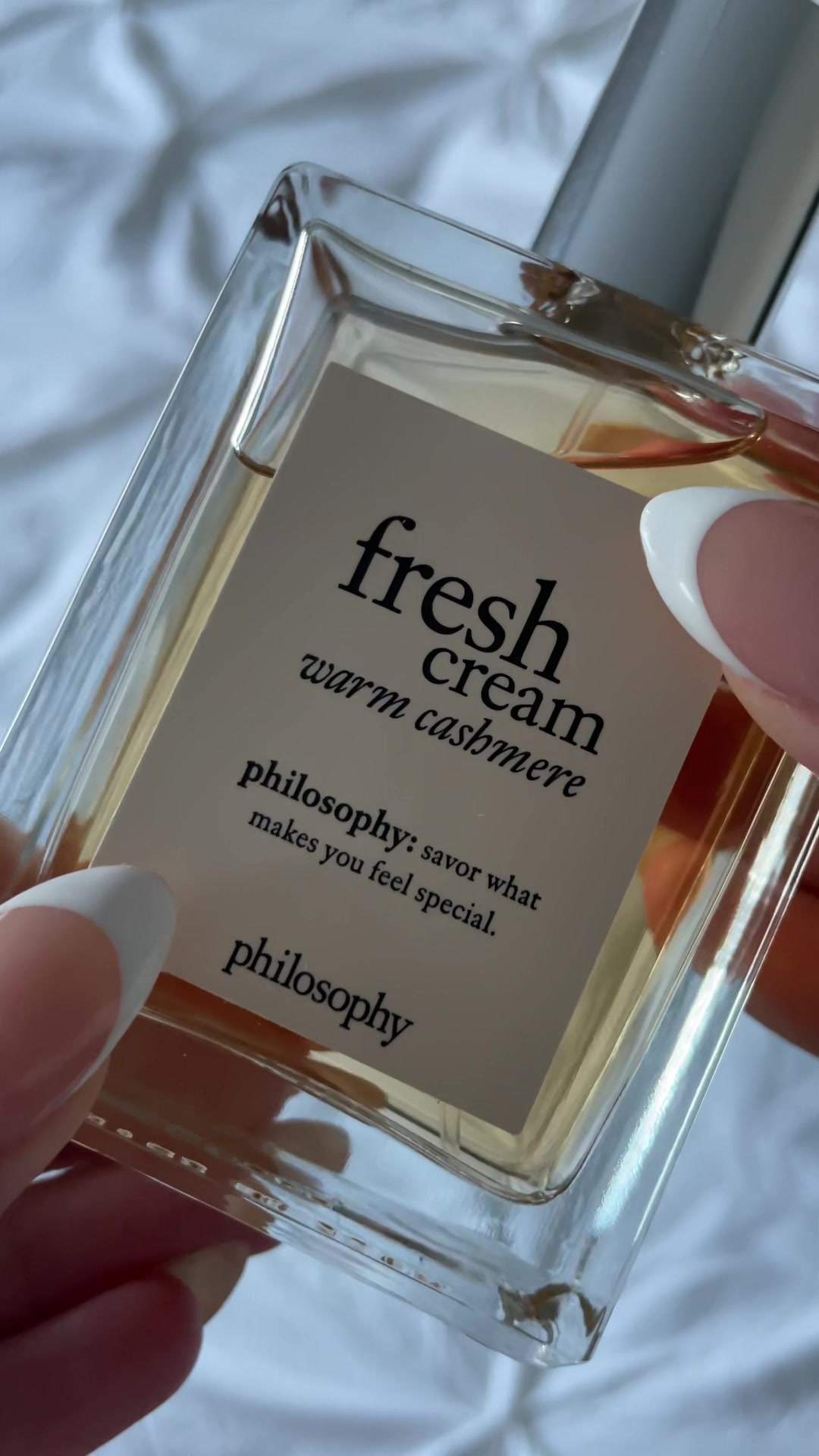 TikTok post by @haleyyypaul for philosophy. Caption reads: warmth in a bottle 🤎🧺🧸 @philosophy Fresh Cream....