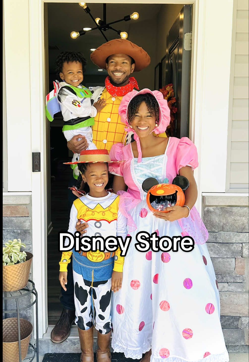 TikTok post by @camifrobabe for Disney Store. Caption reads: #AD Halloween came early in our house 🎃 Thanks to....