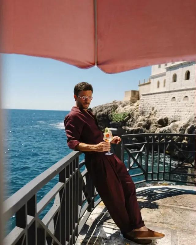 Instagram post by @jonnybaileyitaly for MARTINI. Caption reads: Jonathan for @martini 🤍🍸 (BTS) Elevate your....