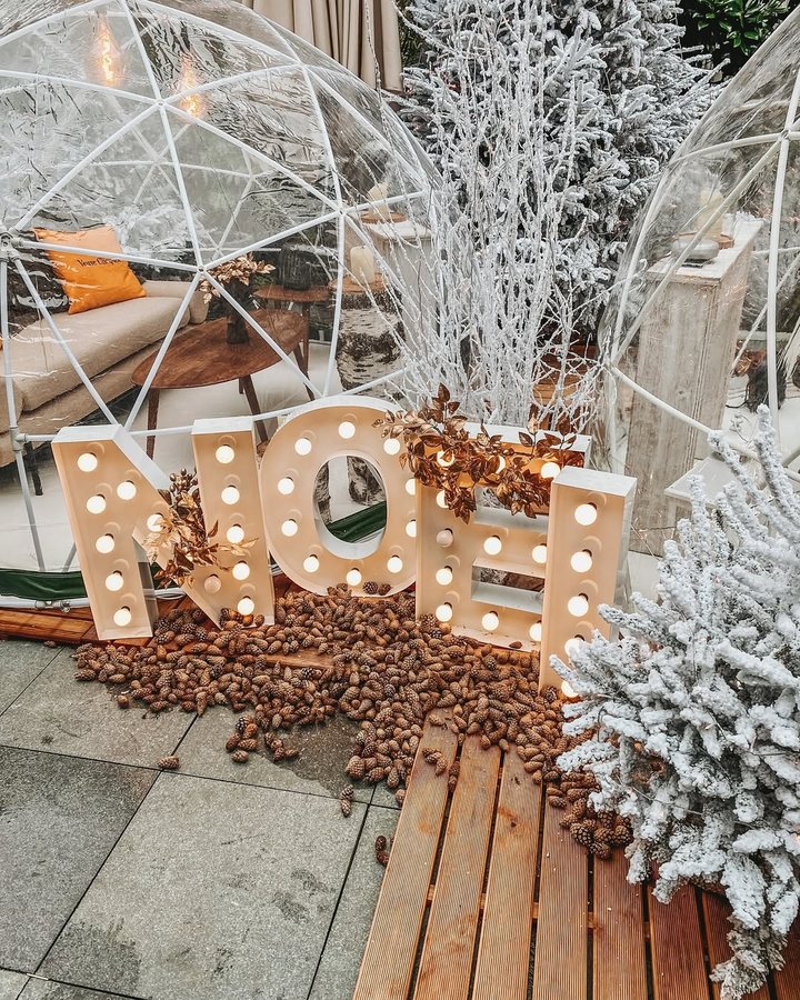 Instagram post by @macaroonsandroses for Optimalprint. Caption reads: Advertisement @optimalprint Spread the holiday....