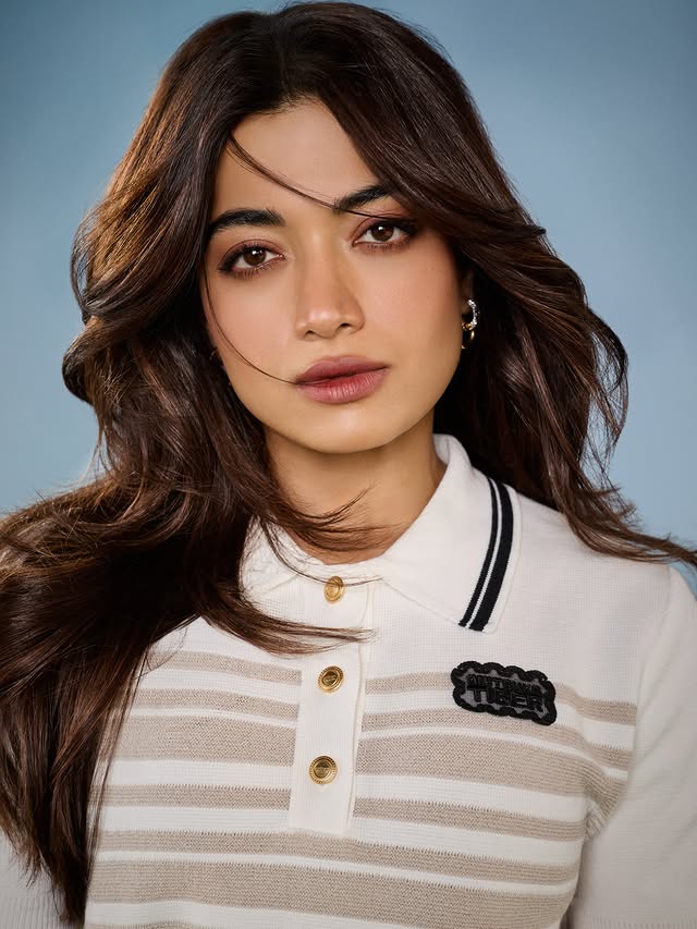 Instagram post by @rashmika_mandanna for Onitsuka Tiger. Caption reads: [...] to start playing golf nowwww! 😭😭❤️....