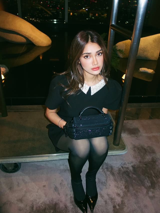 Instagram post by @srushtiporey for AJIO. Caption reads: Taking only the essentials and my @michaelkors....