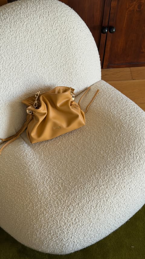 Instagram post by an influencer for Liu Jo. Caption reads: [...] bag, let’s see what’s inside @liujo....
