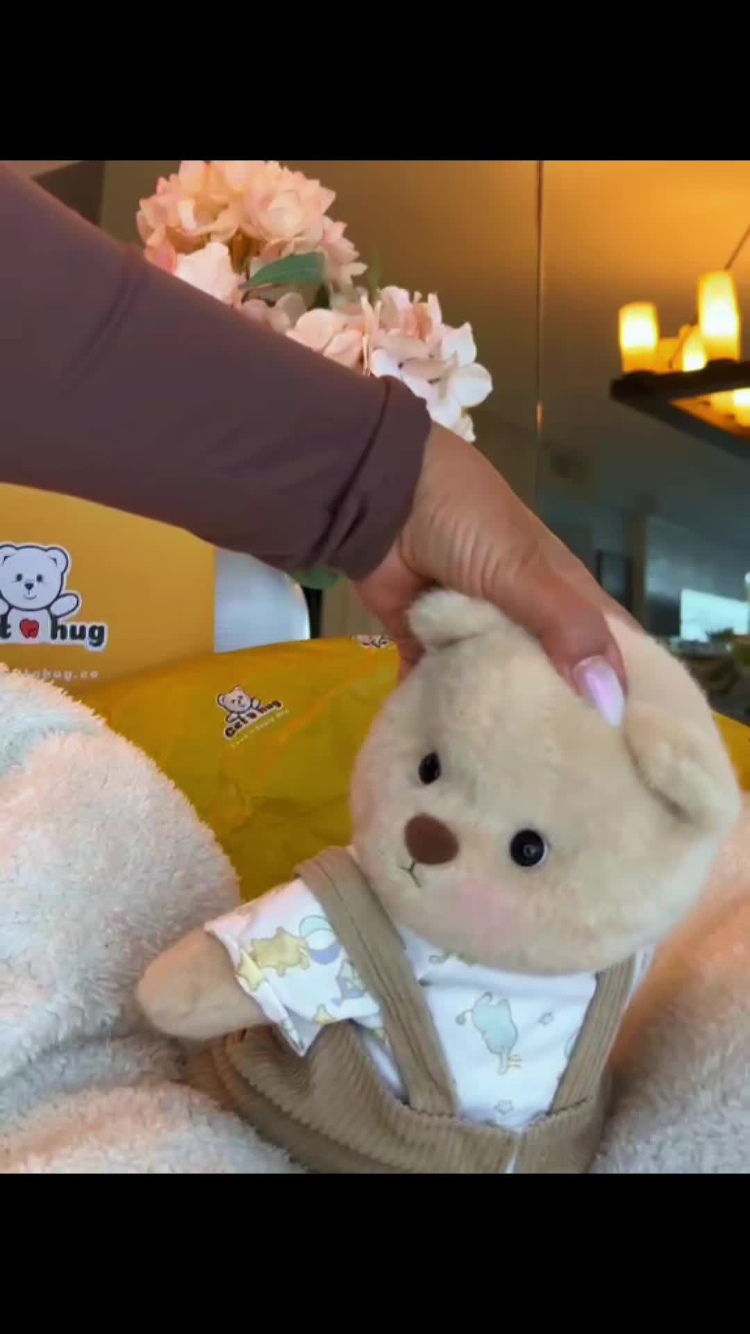 TikTok post by an influencer for Getahug. Caption reads: [...] #giftideas #Toy #دبدوبة #kids @Getahug.co....
