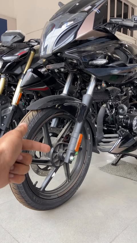 Instagram post by @rgbbikes for Bajaj Auto. Caption reads: 2026 Bajaj Pulsar 220F Wheel Cover . . . . . . . .....