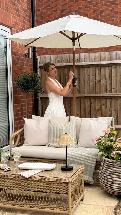 Instagram post by @_katiepeakehome for John Lewis & Partners. Caption reads: Styling our small patio area with stunning....