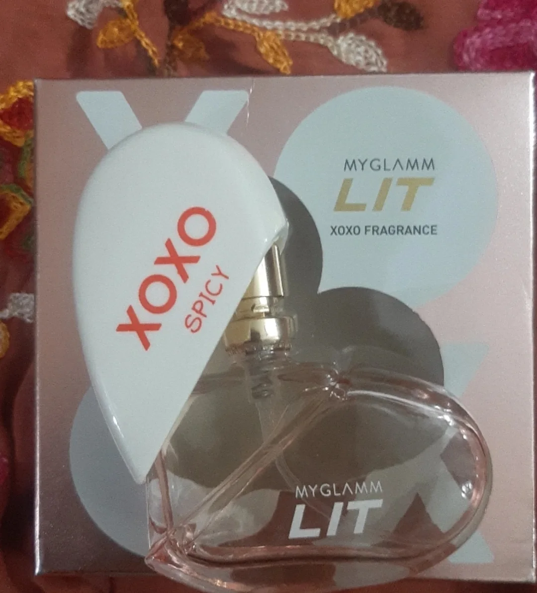 Instagram post by @mimiofali_17 for MyGlamm. Caption reads: Spicy, bold, and unforgettable! The XOXO Spicy by....