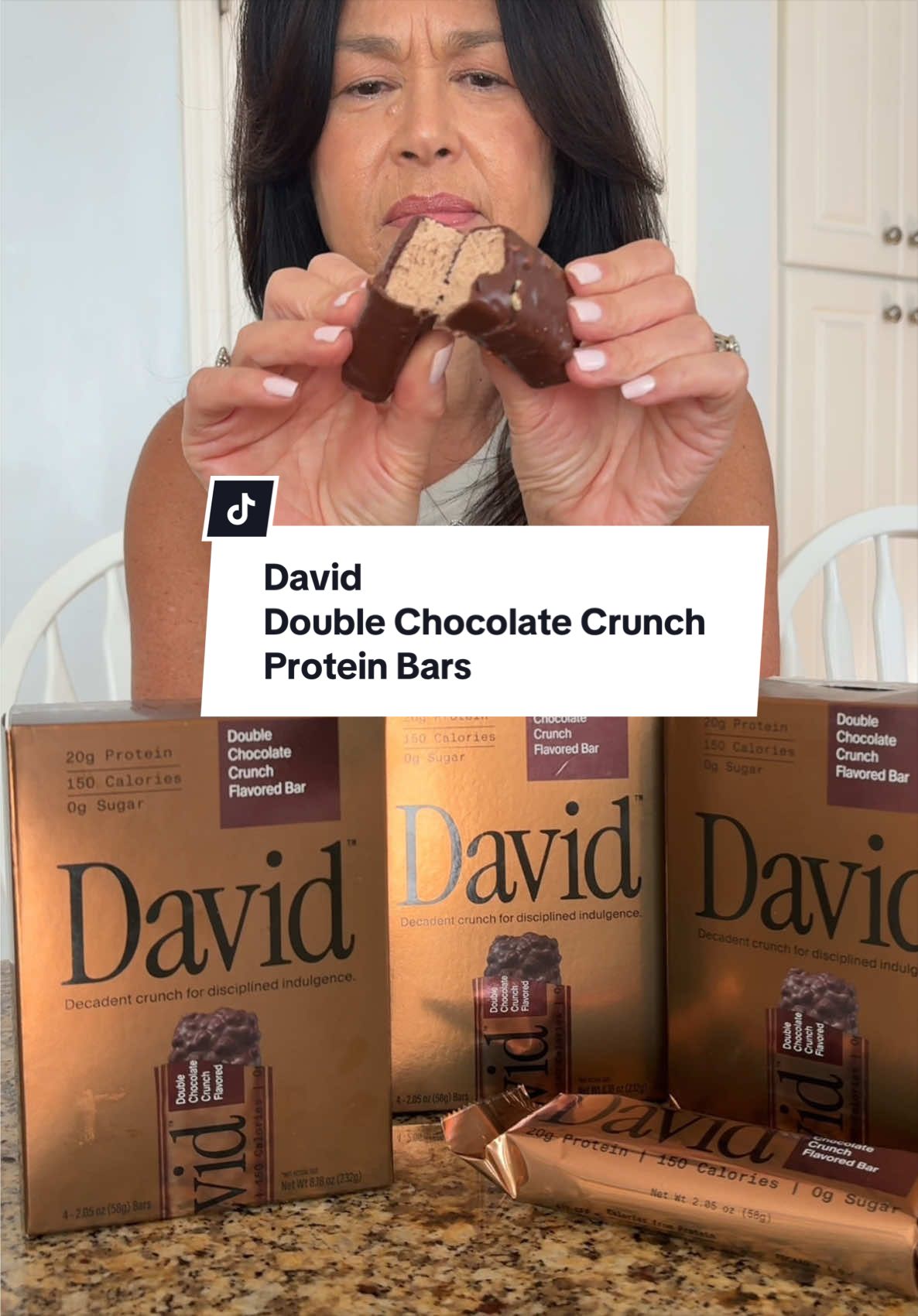 TikTok post by @mariab1006 for David Protein. Caption reads: [...] I linked it in the orange cart below....