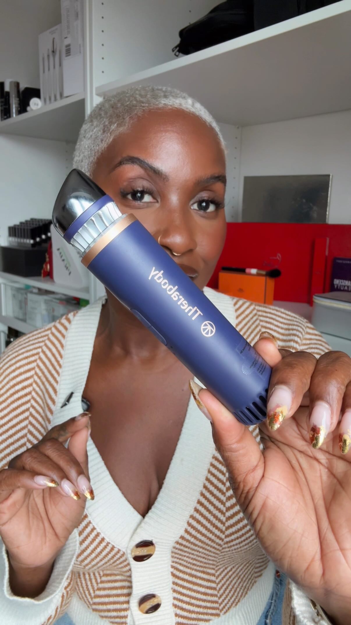 Instagram post by @jessicasmalls for Therabody. Caption reads: NEW Indigo Depuffing Wand Giveaway! 🪄

As a....