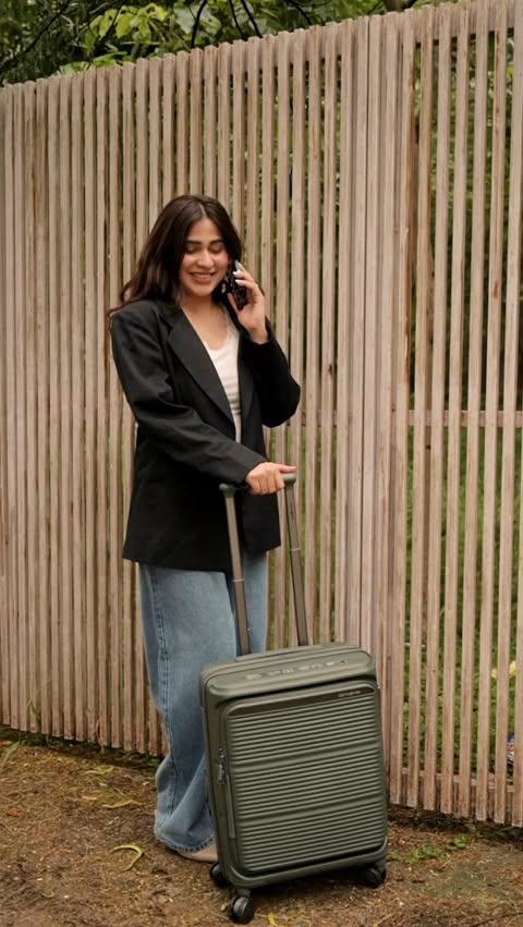 Instagram post by @shivani__kapoor for Samsonite. Caption reads: [...] place! Meet my new travel essential -....