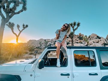 Instagram post by @biancasoffer for LUNA Bar. Caption reads: forever in love with the sun. and this jeep. and....