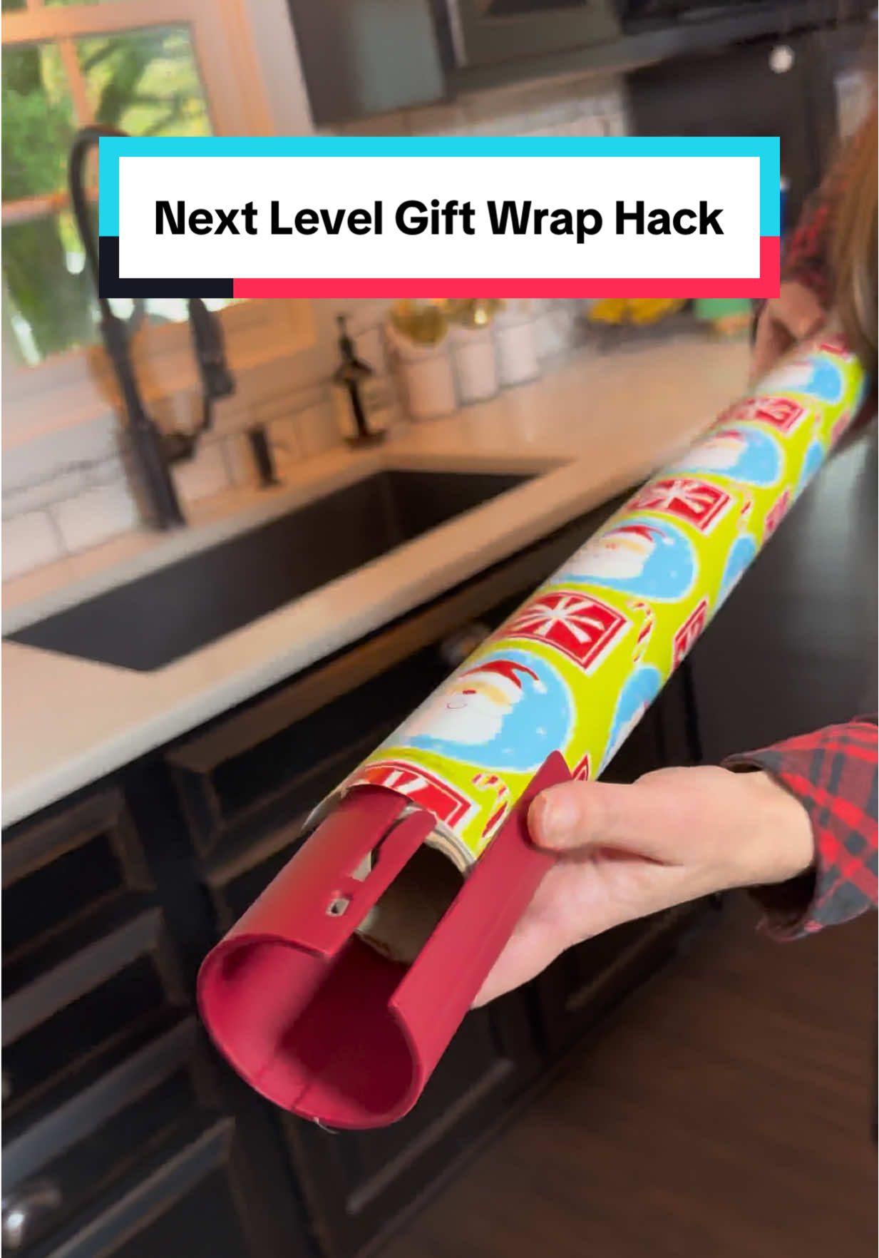 TikTok post by @evaneramagic for Little ELF Products. Caption reads: This gift wrap cutter from @Little ELF Products,....