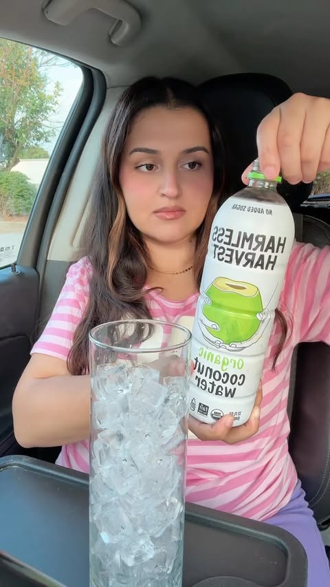 Instagram post by @positivethingshappening for Harmless Harvest. Caption reads: #harmlessharvestpartner #bestcoconutwater this is....