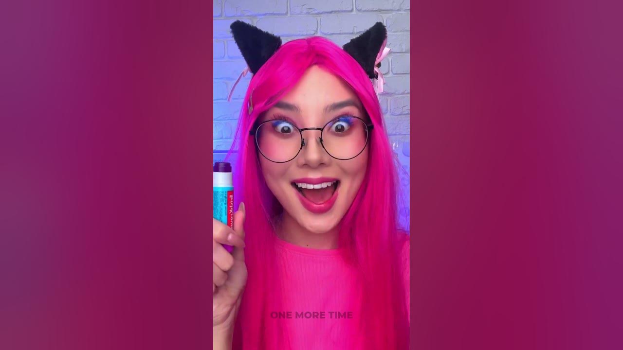 YouTube post by @ClickiClack for Shutterstock. Caption reads: Lipstick Life Hack from Kitty Girl! 💄🐱....
